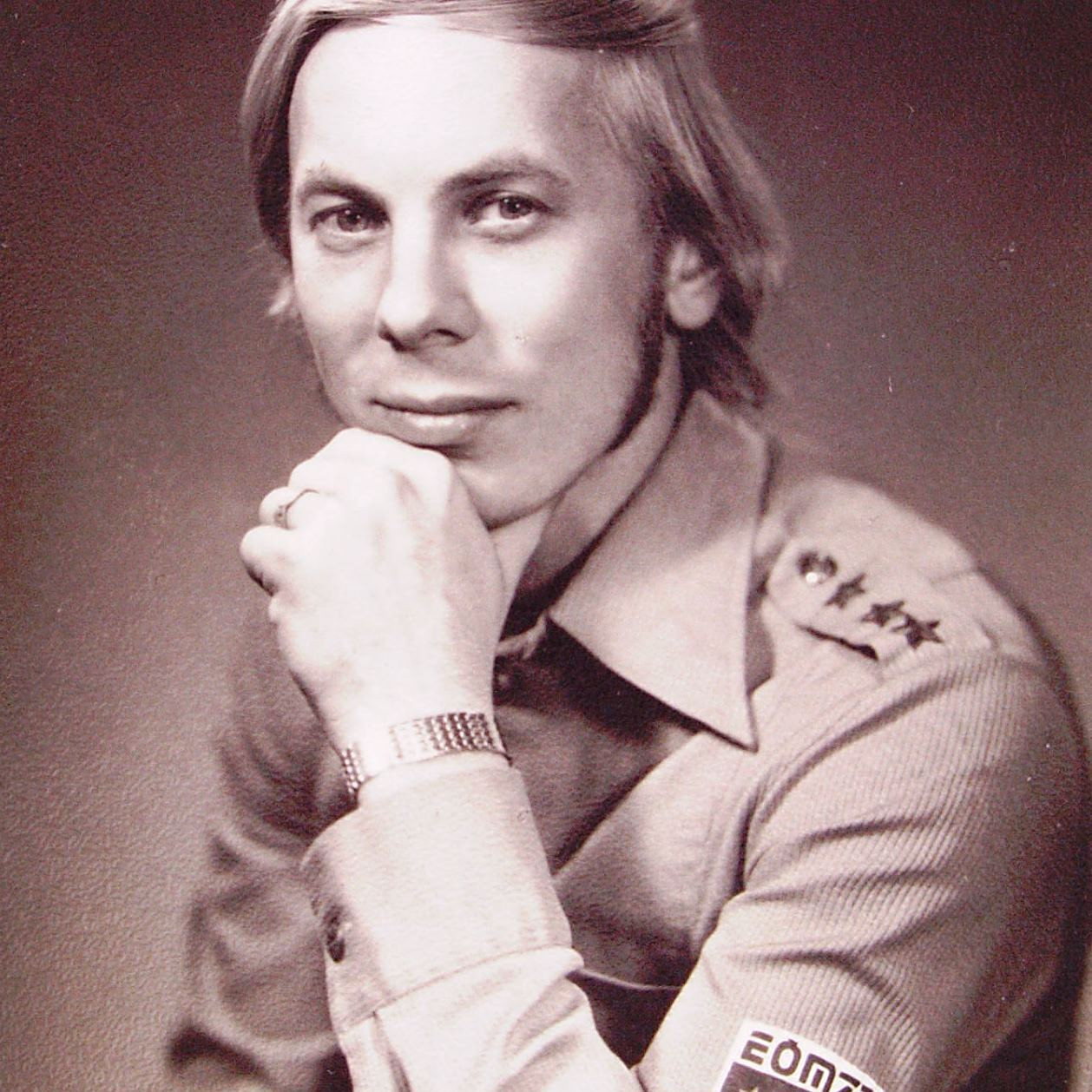 Arvo Tomson logo and brand