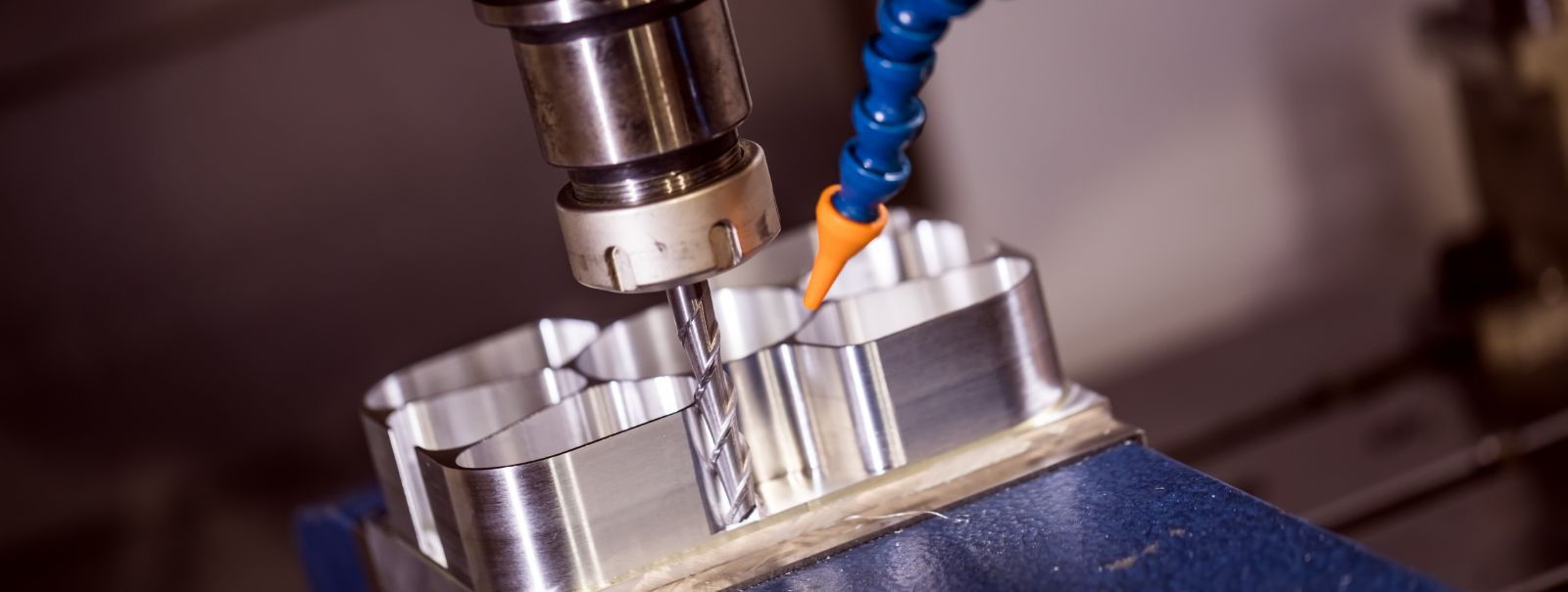 CNC (Computer Numerical Control) milling is a subtractive manufacturing process that uses computer-controlled machine tools to remove material from a solid bloc