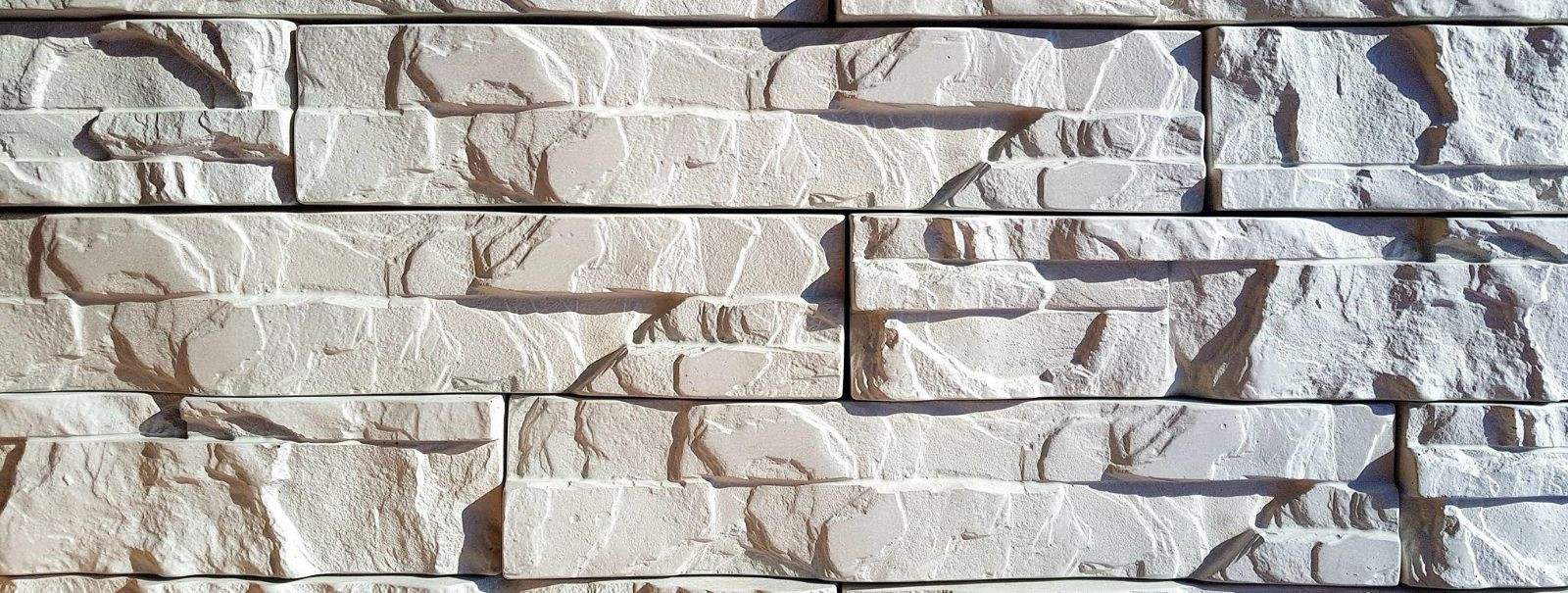 Facade stones serve as the skin of a building, not only providing structural support but also defining its aesthetic character. Customized facade stones elevate