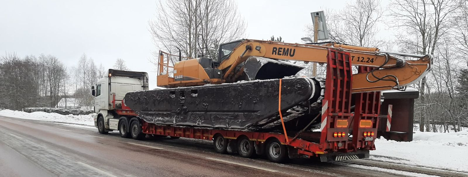 Transporting heavy machinery is a critical task in the construction and development industry, requiring meticulous planning and execution to ensure safety, effi