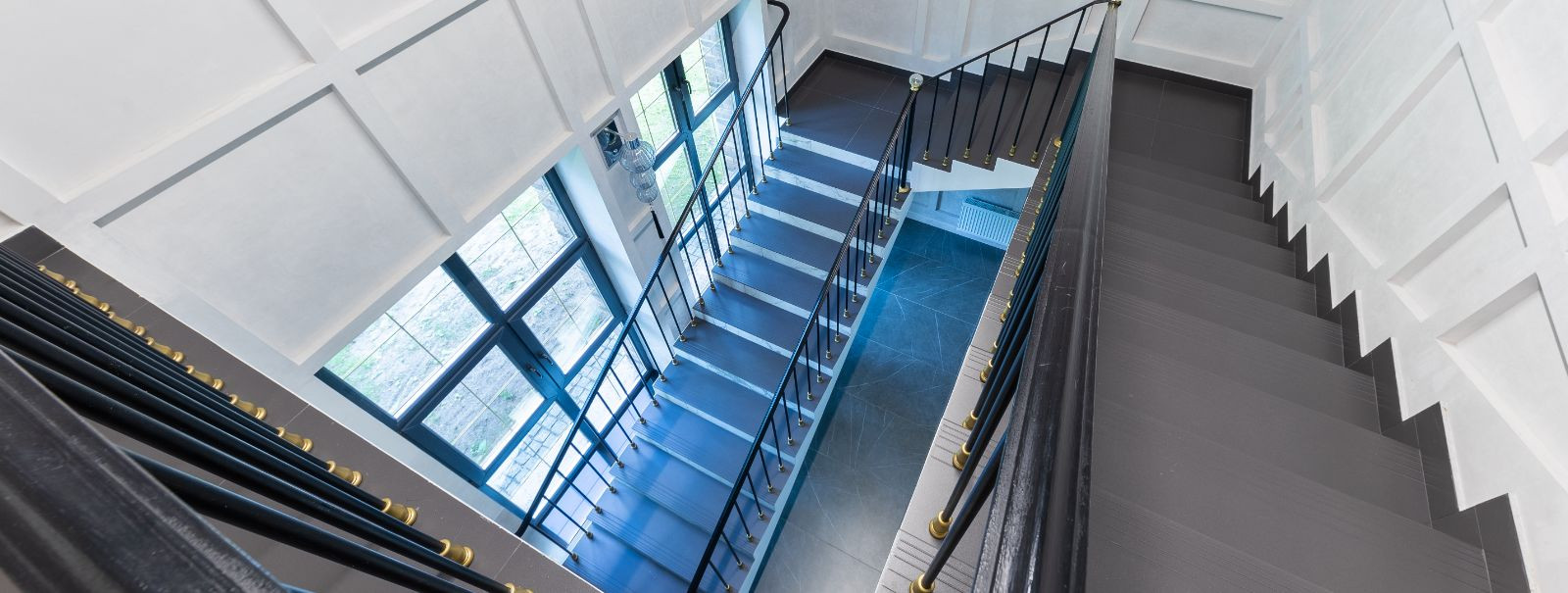 Stairwells are more than just functional spaces; they are the arteries of a building, providing safe passage between floors. A well-maintained stairwell can sig