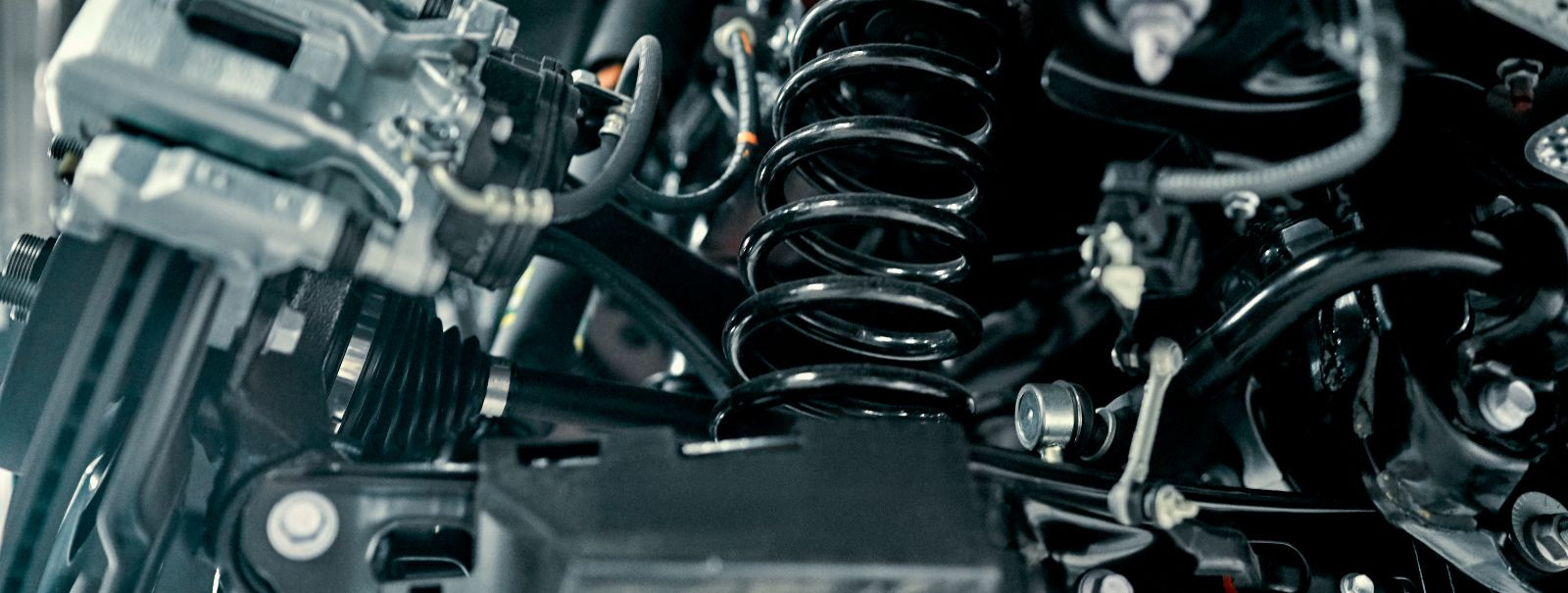 The suspension system of a vehicle is a complex network of components that includes springs, shock absorbers, struts, control arms, and ball joints, among other