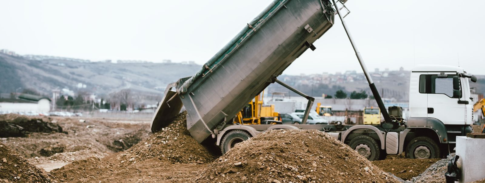 Efficient soil transportation is a critical component of successful construction and landscaping projects. It involves more than just moving dirt; it requires c