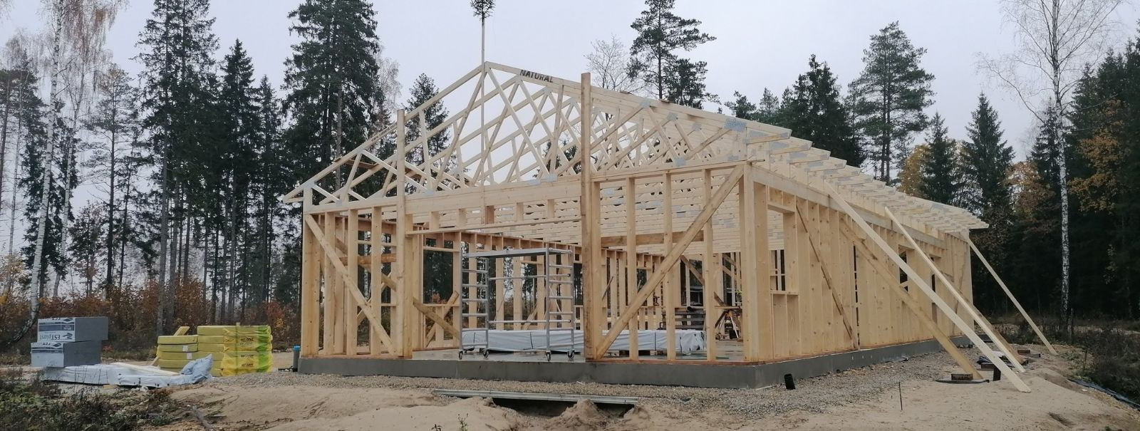 Wooden frame buildings are structures primarily constructed using timber framing techniques. This method involves creating a skeleton of timber that supports th