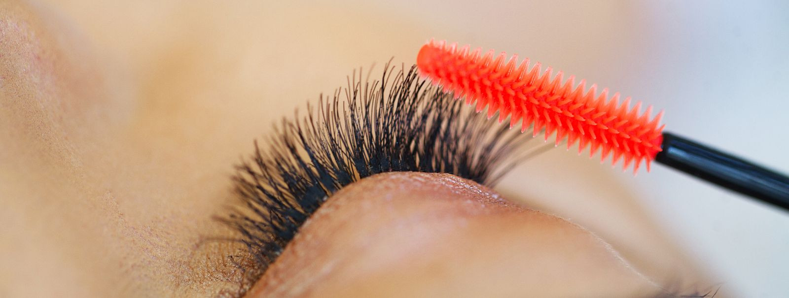 Eyelash extensions are a popular beauty treatment that involves attaching synthetic, silk, or mink lashes to your natural lashes to enhance length, curl, fullne