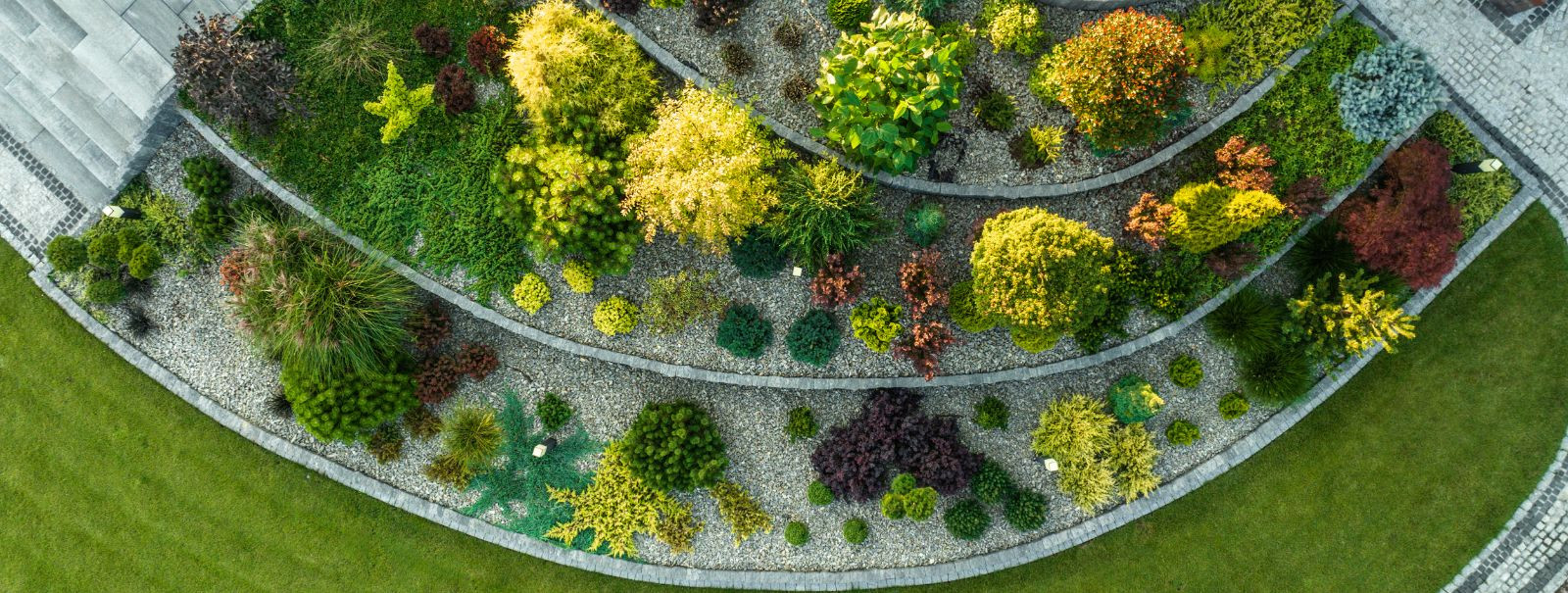 Landscaping is an art form that combines nature with human creativity to transform any space into a harmonious sanctuary. It's about crafting an environment tha